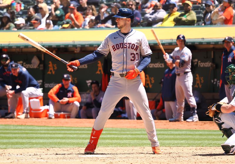 May 25, 2024; Oakland, California, USA; Houston Astros right fielder Kyle Tucker (30) at bat before hitting a sacrifice fly to send in a run Oakland Athletics during the sixth inning at Oakland-Alameda County Coliseum. Mandatory Credit: Kelley L Cox-USA TODAY Sports