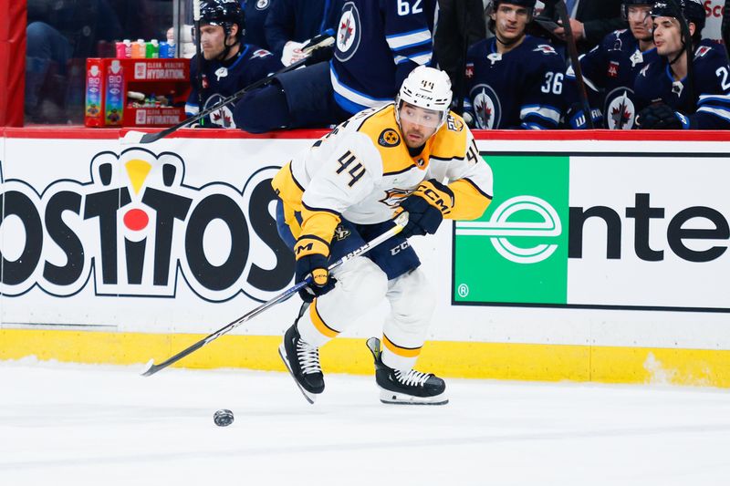 Mar 13, 2024; Winnipeg, Manitoba, CAN; Nashville Predators forward Keifer Sherwood (44) skates into the Winnipeg Jets zone during the first period at Canada Life Centre. Mandatory Credit: Terrence Lee-USA TODAY Sports