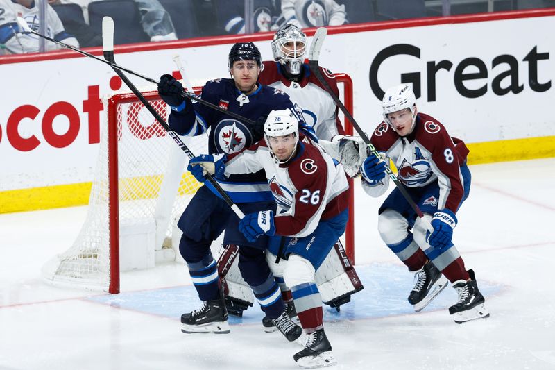 Apr 23, 2024; Winnipeg, Manitoba, CAN; Winnipeg Jets forward Gabriel Vilardi (13) jostles for position with Colorado Avalanche defenseman Sean Walker (26) and  defenseman Cale Makar (8) in front of goalie Alexander Georgiev (40) during the third period in game two of the first round of the 2024 Stanley Cup Playoffs at Canada Life Centre. Mandatory Credit: Terrence Lee-USA TODAY Sports