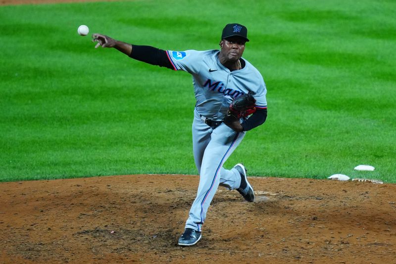 Aug 28, 2024; Denver, Colorado, USA; Miami Marlins pitcher George Soriano (62) delivers a pitch in the eighth inning at Coors Field. Mandatory Credit: Ron Chenoy-USA TODAY Sports