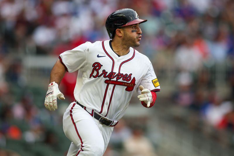 Sep 30, 2024; Atlanta, Georgia, USA; Atlanta Braves left fielder Ramon Laureano (18) hits a home run against the New York Mets in the sixth inning at Truist Park. Mandatory Credit: Brett Davis-Imagn Images
