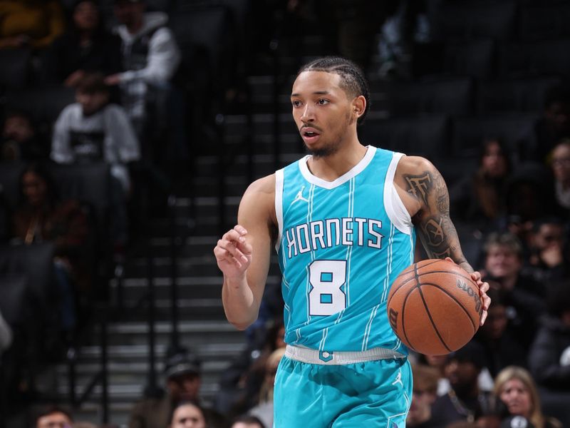 BROOKLYN, NY - FEBRUARY 10: Nick Smith Jr. #8 of the Charlotte Hornets dribbles the ball during the game against the Brooklyn Nets on February 10, 2025 at Barclays Center in Brooklyn, New York. NOTE TO USER: User expressly acknowledges and agrees that, by downloading and or using this Photograph, user is consenting to the terms and conditions of the Getty Images License Agreement. Mandatory Copyright Notice: Copyright 2025 NBAE (Photo by Nathaniel S. Butler/NBAE via Getty Images)