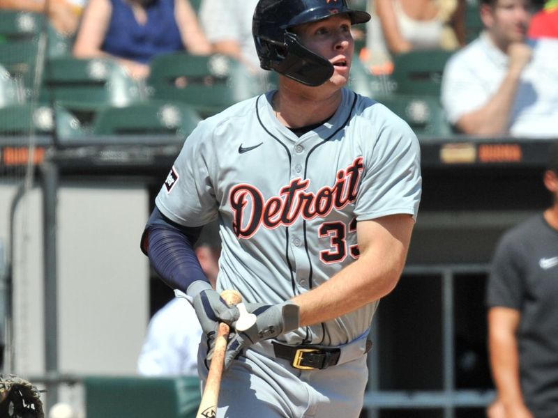 Aug 25, 2024; Chicago, Illinois, USA; Detroit Tigers second base Colt Keith (33) hits an RBI single during the third inning against the Chicago White Sox at Guaranteed Rate Field. Mandatory Credit: Patrick Gorski-USA TODAY Sports