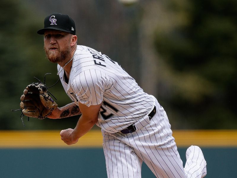 Apr 20, 2025; Denver, Colorado, USA; Colorado Rockies starting pitcher Kyle Freeland (21) pitches in the first inning against the Washington Nationals at Coors Field. Mandatory Credit: Isaiah J. Downing-Imagn Images