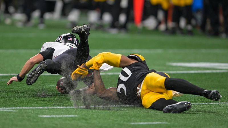 Pittsburgh Steelers linebacker Elandon Roberts sacks Atlanta Falcons quarterback Logan Woodside during the first half of a preseason NFL football game Thursday, Aug. 24, 2023, in Atlanta. (AP Photo/Hakim Wright)