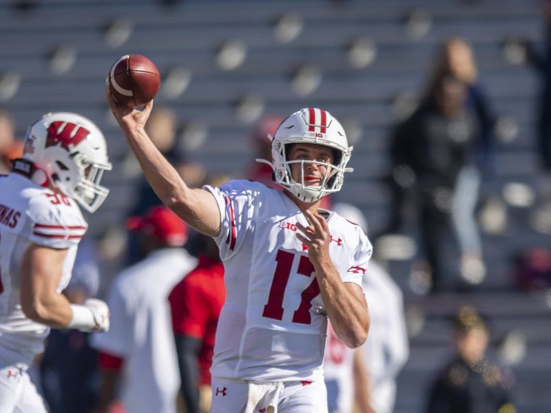 Oct 19, 2019; Champaign, IL, USA; Wisconsin Badgers quarterback Jack Coan (17) warms up prior to the first half against the Illinois Fighting Illini at Memorial Stadium. Mandatory Credit: Patrick Gorski-USA TODAY Sports