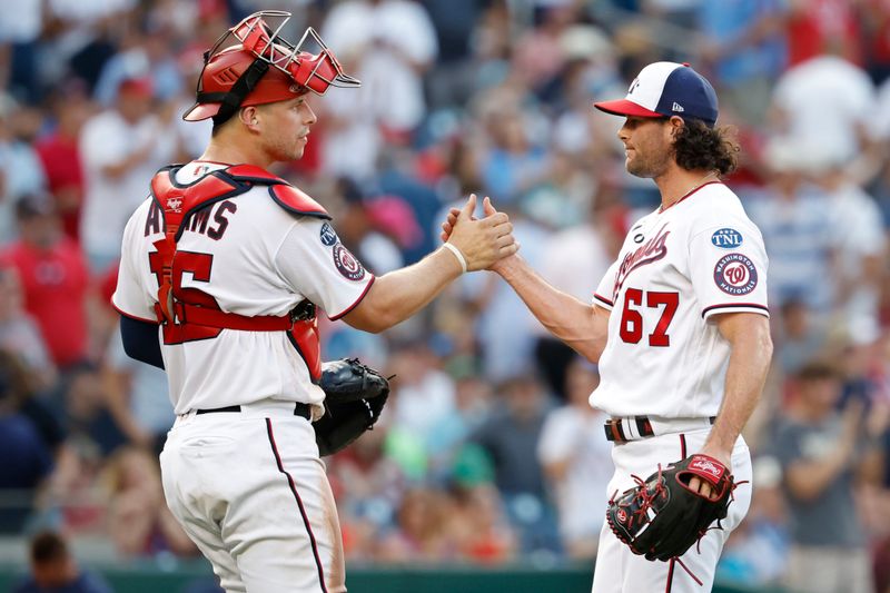 Aug 17, 2023; Washington, District of Columbia, USA; Washington Nationals relief pitcher Kyle Finnegan (67) celebrates with Nationals catcher Riley Adams (15) after their game against the Boston Red Sox at Nationals Park. Mandatory Credit: Geoff Burke-USA TODAY Sports