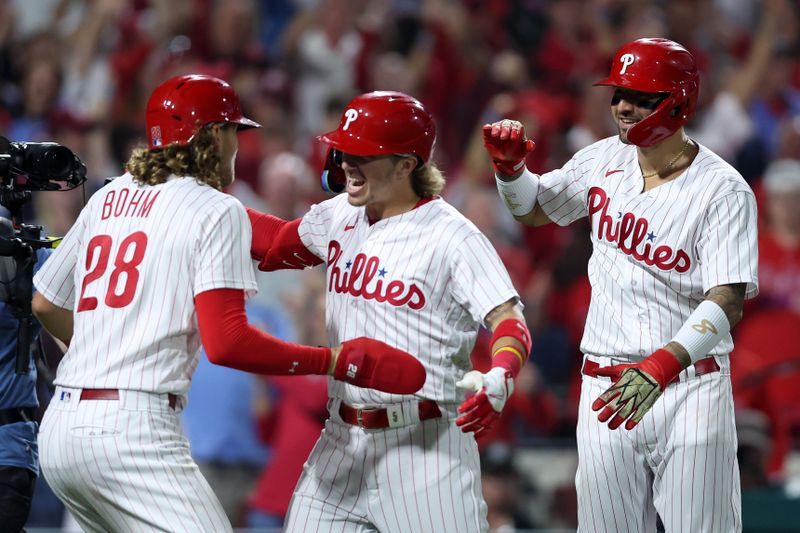 Oct 4, 2023; Philadelphia, Pennsylvania, USA; Philadelphia Phillies second baseman Bryson Stott (5) reacts after hitting  a grand slam against the Miami Marlins during the sixth inning for game two of the Wildcard series for the 2023 MLB playoffs at Citizens Bank Park. Mandatory Credit: Bill Streicher-USA TODAY Sports