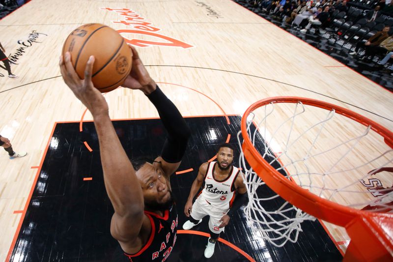 DETROIT, MI - NOVEMBER 25:  Bruno Fernando #24 of the Toronto Raptors shoots the ball during the game against the Detroit Pistons on November 25, 2024 at Little Caesars Arena in Detroit, Michigan. NOTE TO USER: User expressly acknowledges and agrees that, by downloading and/or using this photograph, User is consenting to the terms and conditions of the Getty Images License Agreement. Mandatory Copyright Notice: Copyright 2024 NBAE (Photo by Brian Sevald/NBAE via Getty Images)