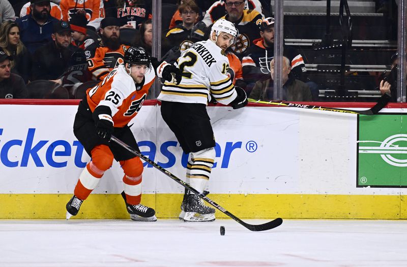 Jan 27, 2024; Philadelphia, Pennsylvania, USA; Philadelphia Flyers center Ryan Poehling (25) reaches for the puck against Boston Bruins defenseman Kevin Shattenkirk (12) in the first period at Wells Fargo Center. Mandatory Credit: Kyle Ross-USA TODAY Sports