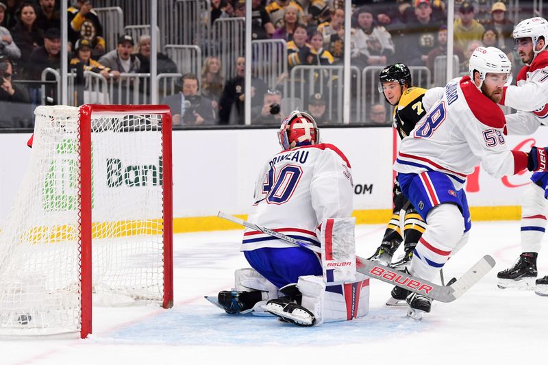 Oct 10, 2024; Boston, Massachusetts, USA; Boston Bruins center Elias Lindholm (28) (not pictured) scores a goal past Montreal Canadiens goaltender Cayden Primeau (30) during the first period at TD Garden. Mandatory Credit: Bob DeChiara-Imagn Images