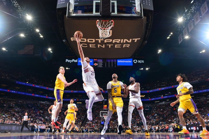 PHOENIX, AZ - OCTOBER 17: Jusuf Nurkic #20 of the Phoenix Suns drives to the basket during the game against the Los Angeles Lakers on October 17, 2024 at Footprint Center in Phoenix, Arizona. NOTE TO USER: User expressly acknowledges and agrees that, by downloading and or using this photograph, user is consenting to the terms and conditions of the Getty Images License Agreement. Mandatory Copyright Notice: Copyright 2024 NBAE (Photo by Kate Frese/NBAE via Getty Images)