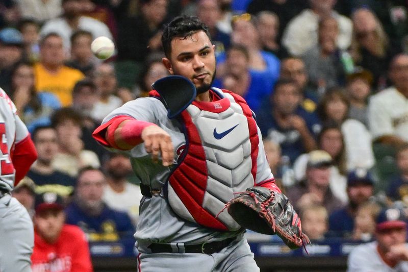 Sep 16, 2023; Milwaukee, Wisconsin, USA;  Washington Nationals catcher Keibert Ruiz (20) throws out Milwaukee Brewers third baseman Josh Donaldson (not pictured) in the third inning at American Family Field. Mandatory Credit: Benny Sieu-USA TODAY Sports