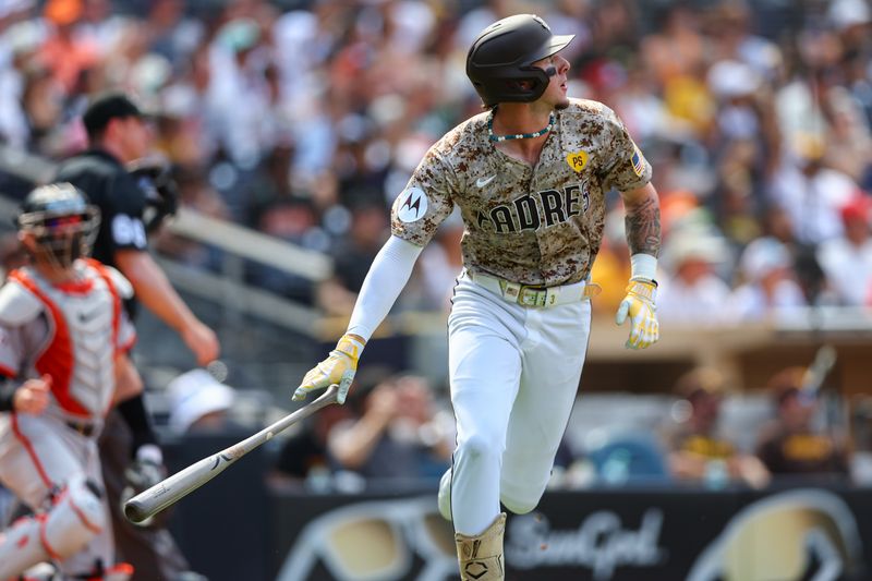 Sep 8, 2024; San Diego, California, USA; San Diego Padres center fielder Jackson Merrill (3) hits a solo home run during the fifth inning against the San Francisco Giants at Petco Park. Mandatory Credit: Chadd Cady-Imagn Images