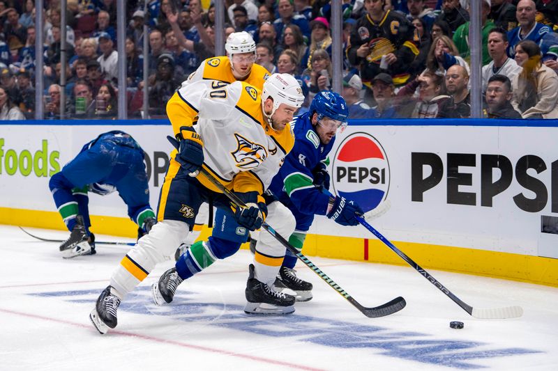 Apr 23, 2024; Vancouver, British Columbia, CAN; Nashville Predators forward Ryan O'Reilly (90) battles with Vancouver Canucks forward Conor Garland (8) during the third period in game two of the first round of the 2024 Stanley Cup Playoffs at Rogers Arena. Mandatory Credit: Bob Frid-USA TODAY Sports