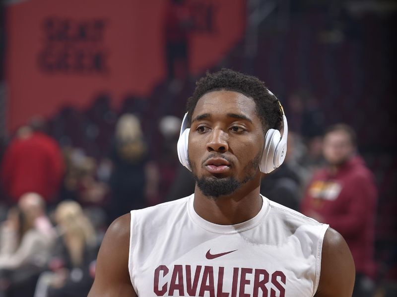 CLEVELAND, OH - NOVEMBER 20: Donovan Mitchell #45 of the Cleveland Cavaliers warms up before the game against the Miami Heat on November 20, 2022 at Rocket Mortgage FieldHouse in Cleveland, Ohio. NOTE TO USER: User expressly acknowledges and agrees that, by downloading and/or using this Photograph, user is consenting to the terms and conditions of the Getty Images License Agreement. Mandatory Copyright Notice: Copyright 2022 NBAE (Photo by David Liam Kyle/NBAE via Getty Images)