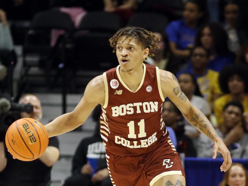 Feb 14, 2023; Pittsburgh, Pennsylvania, USA;  Boston College Eagles guard Makai Ashton-Langford (11) brings the ball up court against the Pittsburgh Panthers during the second half at the Petersen Events Center. Pittsburgh won 77-58. Mandatory Credit: Charles LeClaire-USA TODAY Sports