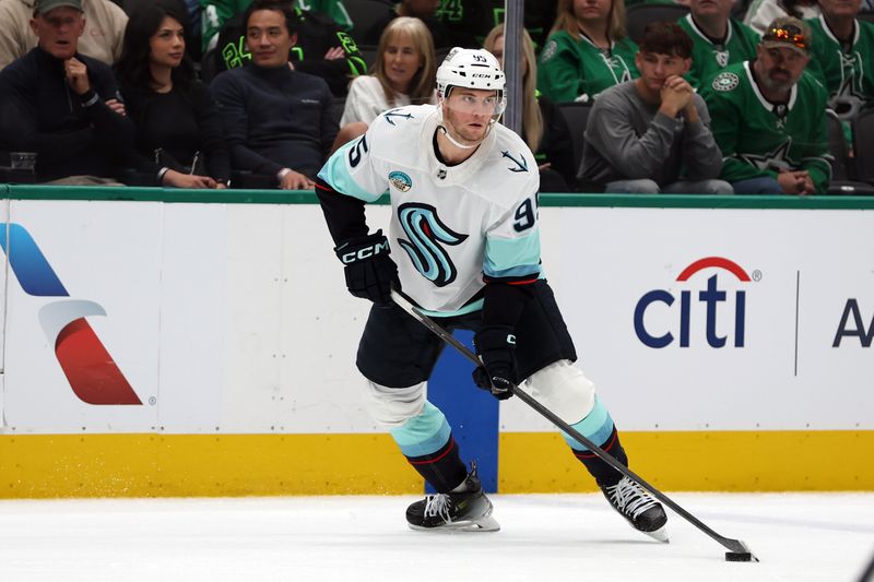 Apr 13, 2024; Dallas, Texas, USA; Seattle Kraken left wing Andre Burakovsky (95) controls the puck against the Dallas Stars in the third period at American Airlines Center. Mandatory Credit: Tim Heitman-USA TODAY Sports