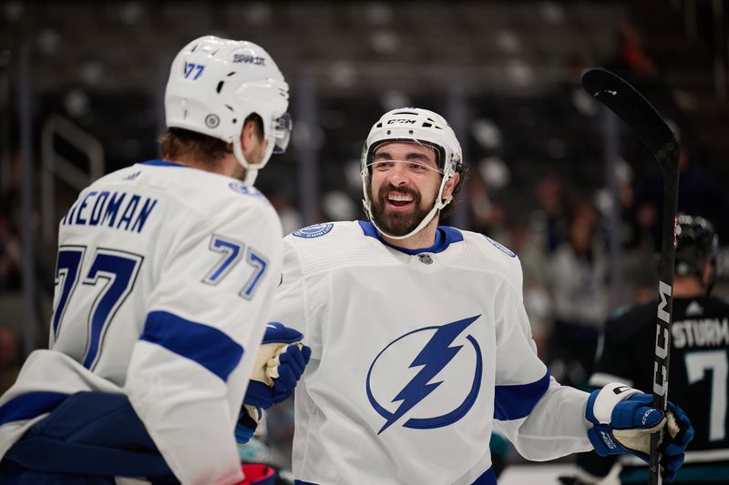 Mar 21, 2024; San Jose, California, USA; Tampa Bay Lightning left wing Nicholas Paul (20) celebrates with defenseman Victor Hedman (77) after scoring a goal against the San Jose Sharks during the first period at SAP Center at San Jose. Mandatory Credit: Robert Edwards-USA TODAY Sports