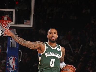 NEW YORK, NY - DECEMBER 25: Damian Lillard #0 of the Milwaukee Bucks brings the ball up court against the New York Knicks on December 25, 2023 at Madison Square Garden in New York City, New York.  NOTE TO USER: User expressly acknowledges and agrees that, by downloading and or using this photograph, User is consenting to the terms and conditions of the Getty Images License Agreement. Mandatory Copyright Notice: Copyright 2023 NBAE  (Photo by Nathaniel S. Butler/NBAE via Getty Images)