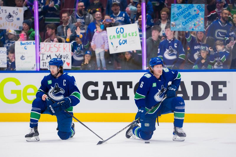 Mar 9, 2024; Vancouver, British Columbia, CAN; Vancouver Canucks defenseman Quinn Hughes (43) and forward Brock Boeser (6) stretch during warm up prior to a game against the Winnipeg Jets at Rogers Arena. Mandatory Credit: Bob Frid-USA TODAY Sports