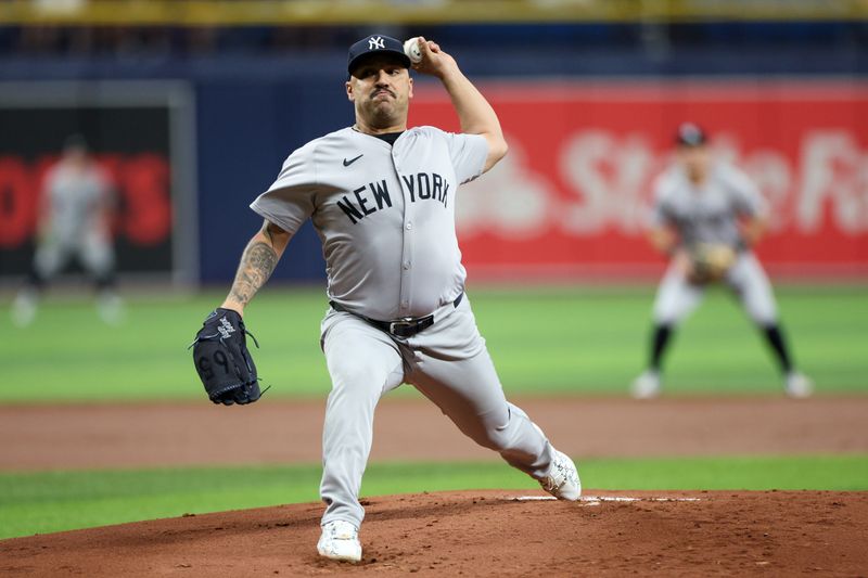 Jul 11, 2024; St. Petersburg, Florida, USA; New York Yankees pitcher Nestor Cortes (65) throws a pitch against the Tampa Bay Rays in the first inning at Tropicana Field. Mandatory Credit: Nathan Ray Seebeck-USA TODAY Sports