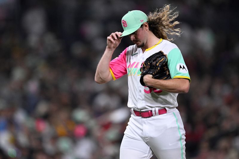 Sep 22, 2023; San Diego, California, USA; San Diego Padres relief pitcher Scott Barlow (58) walks to the dugout after a pitching change during the seventh inning against the St. Louis Cardinals at Petco Park. Mandatory Credit: Orlando Ramirez-USA TODAY Sports
