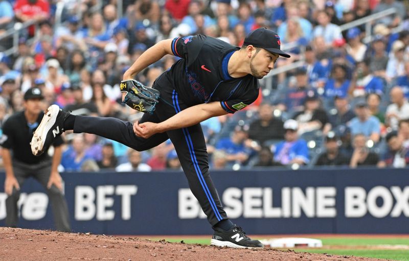 Jul 3, 2024; Toronto, Ontario, CAN; Toronto Blue Jays pitcher Yusei Kikuchi (16) pitches in the second inning against the Houston Astros at Rogers Centre. Mandatory Credit: Gerry Angus-USA TODAY Sports