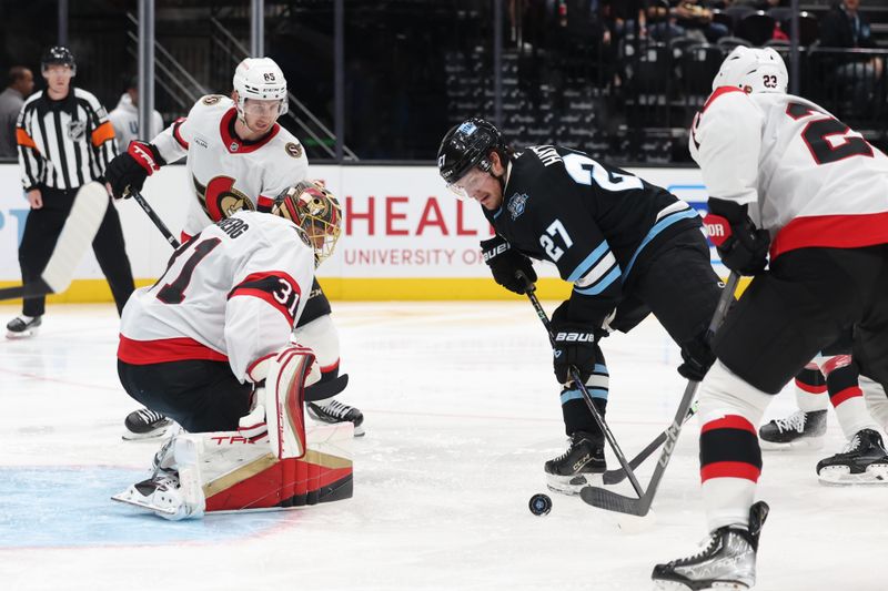 Oct 22, 2024; Salt Lake City, Utah, USA; Utah Hockey Club center Barrett Hayton (27) shoots the puck at Ottawa Senators goaltender Anton Forsberg (31) during the second period at Delta Center. Mandatory Credit: Rob Gray-Imagn Images