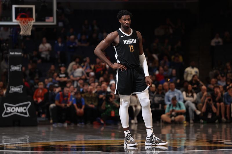 MEMPHIS, TN - MARCH 16:  Jaren Jackson Jr. #13 of the Memphis Grizzlies looks on during the game against the Oklahoma City Thunder on March 16, 2024 at FedExForum in Memphis, Tennessee. NOTE TO USER: User expressly acknowledges and agrees that, by downloading and or using this photograph, User is consenting to the terms and conditions of the Getty Images License Agreement. Mandatory Copyright Notice: Copyright 2024 NBAE (Photo by Joe Murphy/NBAE via Getty Images)