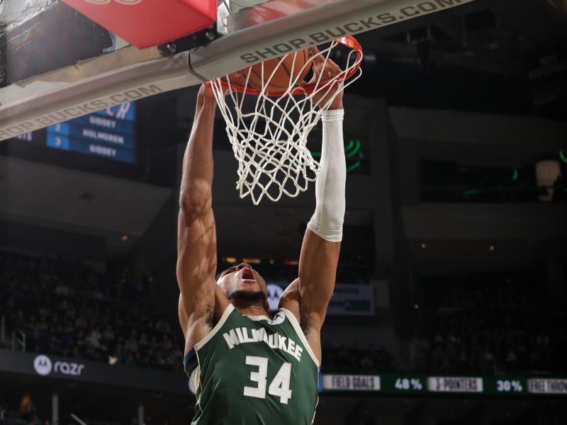 MILWAUKEE, WI - MARCH 24:  Giannis Antetokounmpo #34 of the Milwaukee Bucks dunks the ball during the game against the Oklahoma City Thunder on March 24, 2024 at the Fiserv Forum Center in Milwaukee, Wisconsin. NOTE TO USER: User expressly acknowledges and agrees that, by downloading and or using this Photograph, user is consenting to the terms and conditions of the Getty Images License Agreement. Mandatory Copyright Notice: Copyright 2024 NBAE (Photo by Gary Dineen/NBAE via Getty Images).