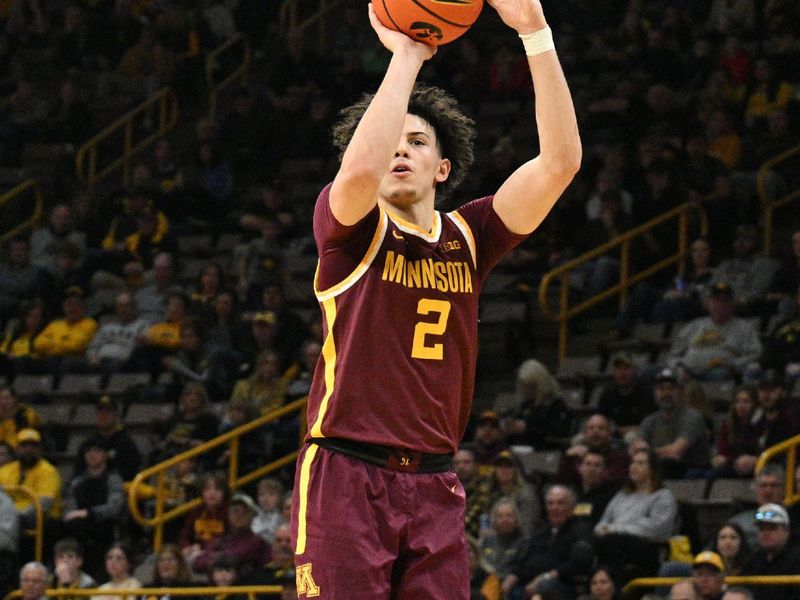 Feb 11, 2024; Iowa City, Iowa, USA; Minnesota Golden Gophers guard Mike Mitchell Jr. (2) shoots a three point basket against the Iowa Hawkeyes during the first half at Carver-Hawkeye Arena. Mandatory Credit: Jeffrey Becker-USA TODAY Sports