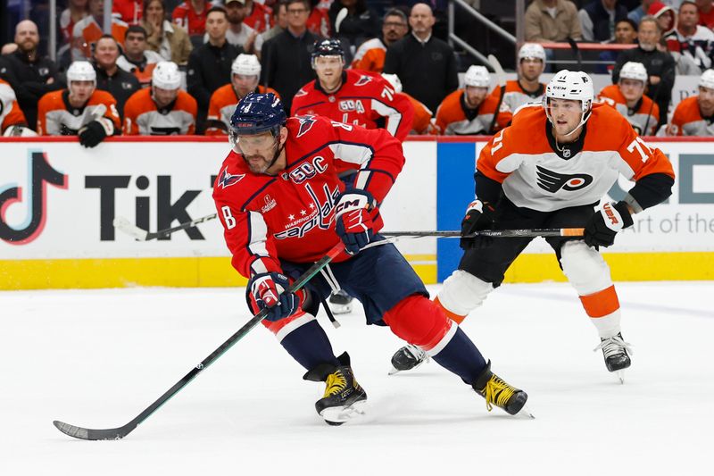 Oct 23, 2024; Washington, District of Columbia, USA; Washington Capitals left wing Alex Ovechkin (8) skates with the puck as Philadelphia Flyers right wing Tyson Foerster (71) chase in the first period at Capital One Arena. Mandatory Credit: Geoff Burke-Imagn Images