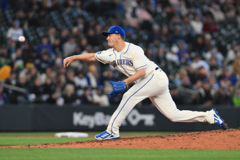 Apr 16, 2023; Seattle, Washington, USA; Seattle Mariners relief pitcher Paul Sewald (37) pitches to the Colorado Rockies during the ninth inning at T-Mobile Park. Mandatory Credit: Steven Bisig-USA TODAY Sports