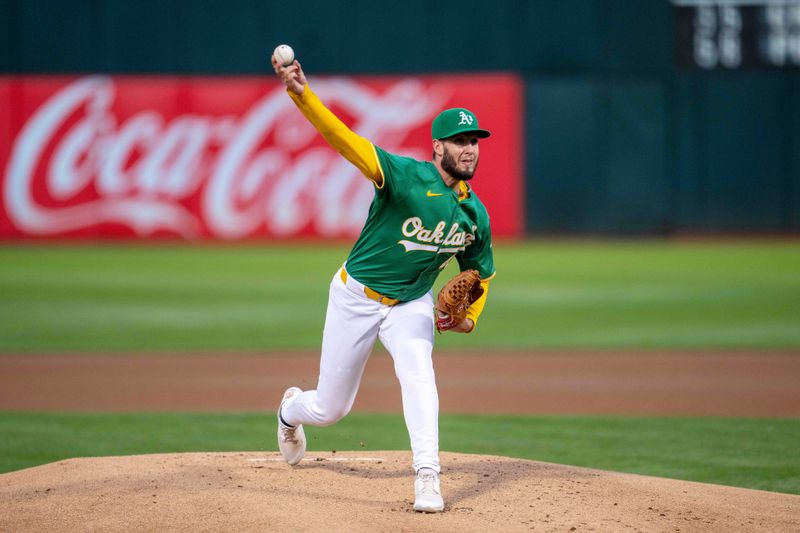 Sep 24, 2024; Oakland, California, USA; Oakland Athletics starting pitcher Mitch Spence (40) pitches against the Texas Rangers during the first inning at Oakland-Alameda County Coliseum. Mandatory Credit: Neville E. Guard-Imagn Images