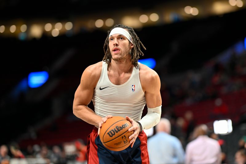 PORTLAND, OREGON - MARCH 23: Aaron Gordon #50 of the Denver Nuggets warms up before the game against the Portland Trail Blazers at the Moda Center on March 23, 2024 in Portland, Oregon. NOTE TO USER: User expressly acknowledges and agrees that, by downloading and or using this photograph, User is consenting to the terms and conditions of the Getty Images License Agreement. (Photo by Alika Jenner/Getty Images)