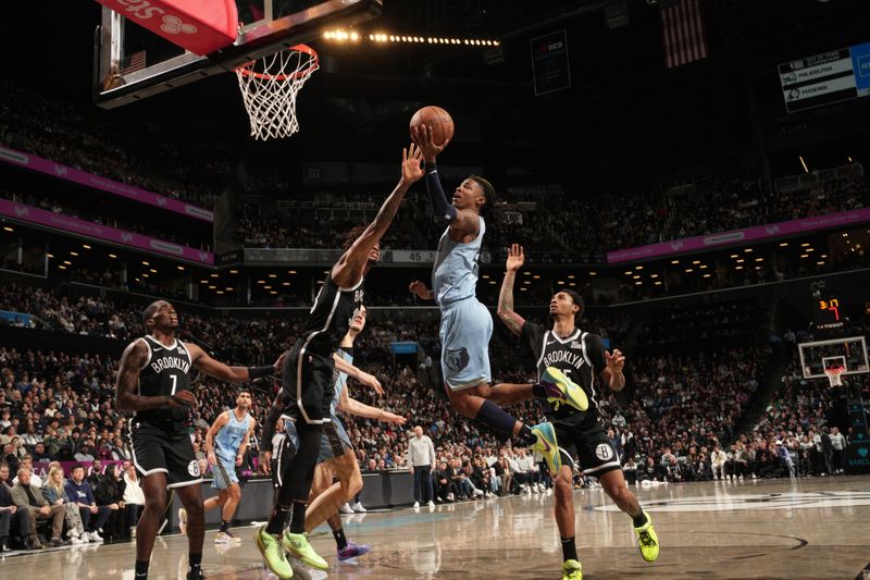 BROOKLYN, NY - NOVEMBER 4: Ja Morant #12 of the Memphis Grizzlies drives to the basket during the game against the Brooklyn Nets on November 4, 2024 at Barclays Center in Brooklyn, New York. NOTE TO USER: User expressly acknowledges and agrees that, by downloading and or using this Photograph, user is consenting to the terms and conditions of the Getty Images License Agreement. Mandatory Copyright Notice: Copyright 2024 NBAE (Photo by Jesse D. Garrabrant/NBAE via Getty Images)