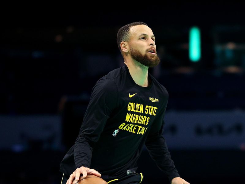 CHARLOTTE, NORTH CAROLINA - MARCH 29: Stephen Curry #30 of the Golden State Warriors warms up prior to the game against the Charlotte Hornets at Spectrum Center on March 29, 2024 in Charlotte, North Carolina. NOTE TO USER: User expressly acknowledges and agrees that, by downloading and or using this photograph, User is consenting to the terms and conditions of the Getty Images License Agreement. (Photo by Jared C. Tilton/Getty Images)