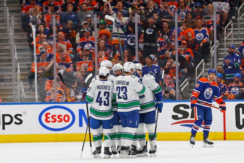 May 12, 2024; Edmonton, Alberta, CAN;The Vancouver Canucks celebrate a goal by  forward Brock Boeser (6) during the first period against the Edmonton Oilers in game three of the second round of the 2024 Stanley Cup Playoffs at Rogers Place. Mandatory Credit: Perry Nelson-USA TODAY Sports