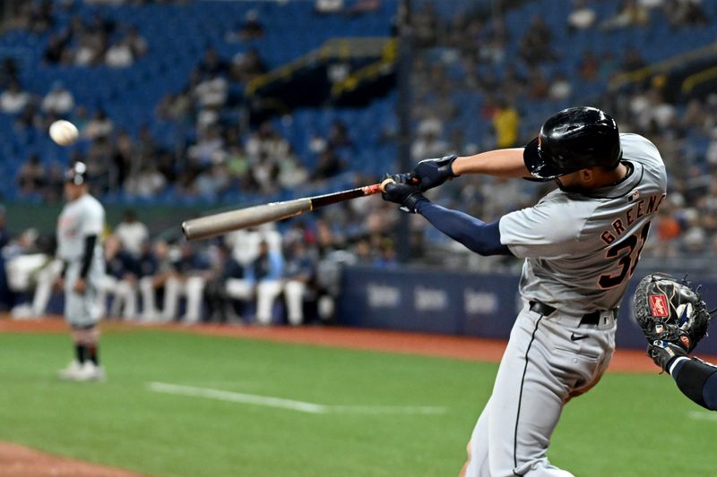 Apr 23, 2024; St. Petersburg, Florida, USA; Detroit Tigers designated hitter Riley Greene (31) hits a two-run home run in the eighth inning against the Tampa Bay Rays at Tropicana Field. Mandatory Credit: Jonathan Dyer-USA TODAY Sports