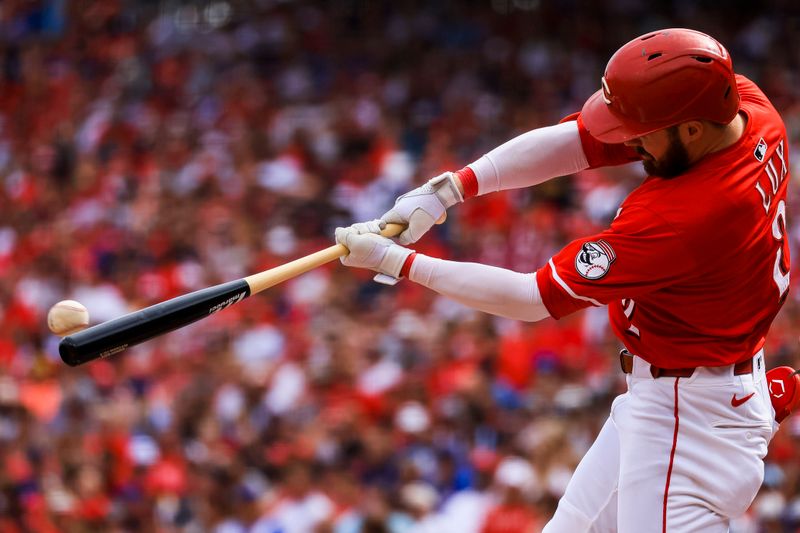 Sep 21, 2025; Cincinnati, Ohio, USA; Cincinnati Reds designated hitter Gavin Lux (2) hits a RBI double in the third inning against the Chicago Cubs at Great American Ball Park. Mandatory Credit: Katie Stratman-Imagn Images