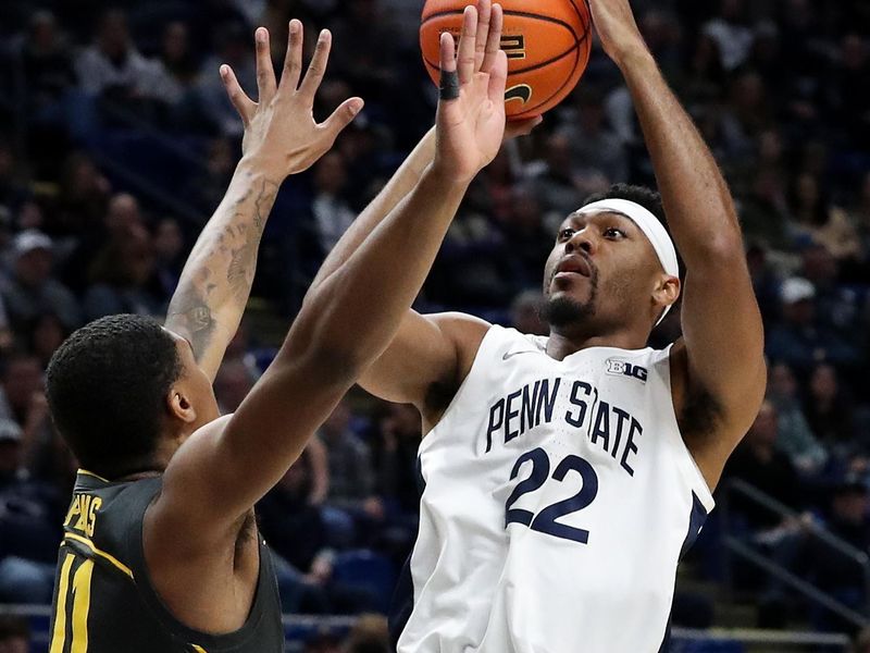 Jan 1, 2023; University Park, Pennsylvania, USA; Penn State Nittany Lions guard Jalen Pickett (22) shoots the ball as Iowa Hawkeyes guard Tony Perkins (11) defends during the first half at Bryce Jordan Center. Mandatory Credit: Matthew OHaren-USA TODAY Sports