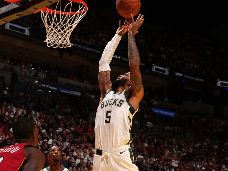 MIAMI, FL - NOVEMBER 26: Gary Trent Jr. #5 of the Milwaukee Bucks rebounds the ball during the game against the Miami Heat during the Emirates NBA Cup game on November 26, 2024 at Kaseya Center in Miami, Florida. NOTE TO USER: User expressly acknowledges and agrees that, by downloading and or using this Photograph, user is consenting to the terms and conditions of the Getty Images License Agreement. Mandatory Copyright Notice: Copyright 2024 NBAE (Photo by Issac Baldizon/NBAE via Getty Images)