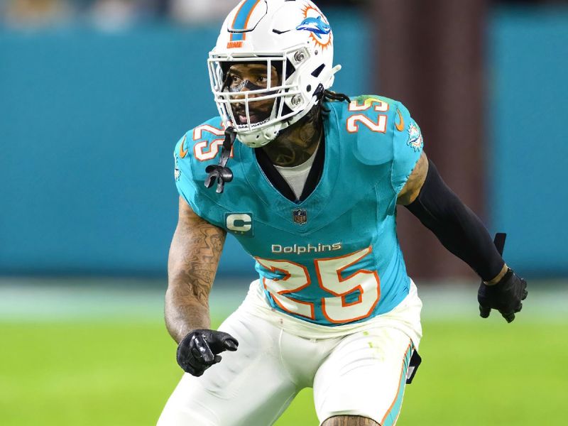 Miami Dolphins cornerback Xavien Howard (25) runs a play during an NFL football game against the Tennessee Titans Monday, Dec. 12, 2023, in Miami Gardens, Fla. (AP Photo/Doug Murray)