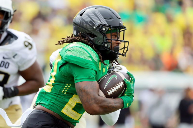 Sep 23, 2023; Eugene, Oregon, USA; Oregon Ducks running back Jordan James (20) runs the ball during the first half against the Colorado Buffaloes at Autzen Stadium. Mandatory Credit: Soobum Im-USA TODAY Sports