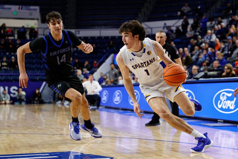 Jan 13, 2024; Colorado Springs, Colorado, USA; San Jose State Spartans guard Garrett Anderson (1) controls the ball ahead of Air Force Falcons forward Beau Becker (14) in the second half at Clune Arena. Mandatory Credit: Isaiah J. Downing-USA TODAY Sports