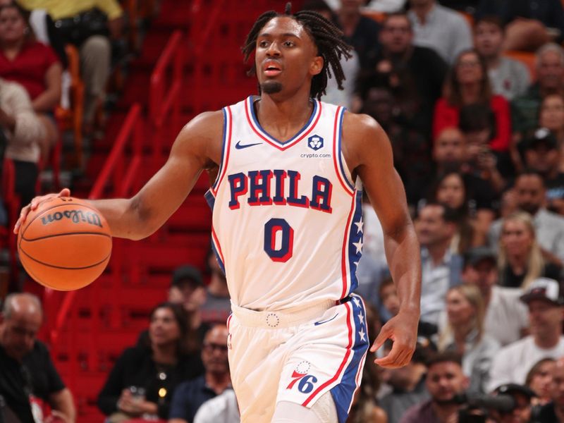 MIAMI, FL - APRIL 4: Tyrese Maxey #0 of the Philadelphia 76ers brings the ball up court during the game against the Miami Heat on April 4, 2024 at Kaseya Center in Miami, Florida. NOTE TO USER: User expressly acknowledges and agrees that, by downloading and or using this Photograph, user is consenting to the terms and conditions of the Getty Images License Agreement. Mandatory Copyright Notice: Copyright 2024 NBAE (Photo by Issac Baldizon/NBAE via Getty Images)