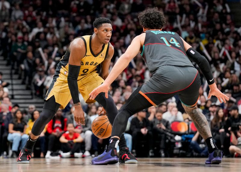 TORONTO, ON - APRIL 7: RJ Barrett #9 of the Toronto Raptors dribbles against the Washington Wizards during the second half of their basketball game at the Scotiabank Arena on April 7, 2024 in Toronto, Ontario, Canada. NOTE TO USER: User expressly acknowledges and agrees that, by downloading and/or using this Photograph, user is consenting to the terms and conditions of the Getty Images License Agreement. (Photo by Mark Blinch/Getty Images)