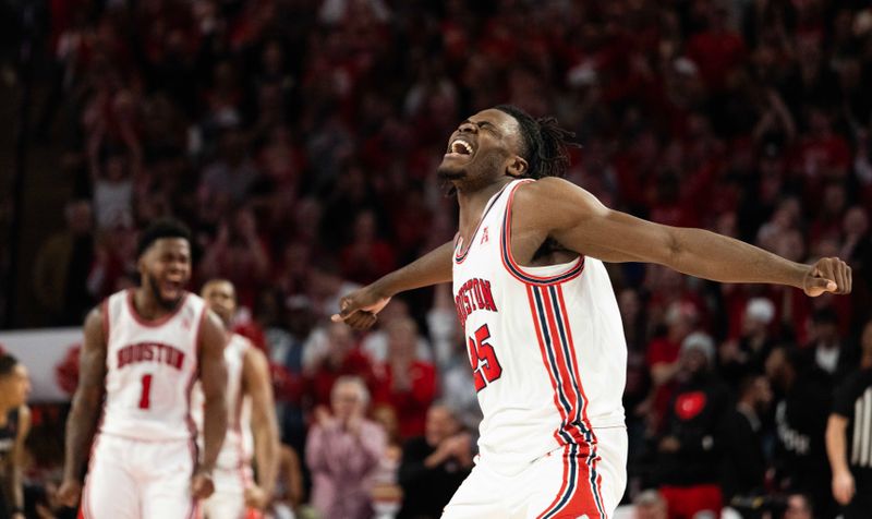 Jan 28, 2023; Houston, Texas, USA; Houston Cougars forward Jarace Walker (25) and Houston Cougars guard Jamal Shead (1) celebrate against the Cincinnati Bearcats in the second half at Fertitta Center. Houston Cougars won 75 to 69 .Mandatory Credit: Thomas Shea-USA TODAY Sports