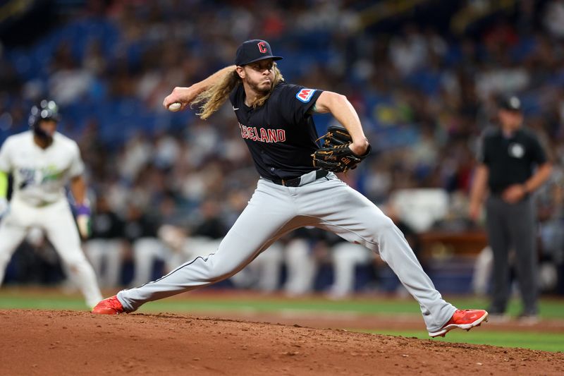 Jul 12, 2024; St. Petersburg, Florida, USA; Cleveland Guardians pitcher Scott Barlow (58) throws a pitch against the Tampa Bay Rays in the sixth inning at Tropicana Field. Mandatory Credit: Nathan Ray Seebeck-USA TODAY Sports
